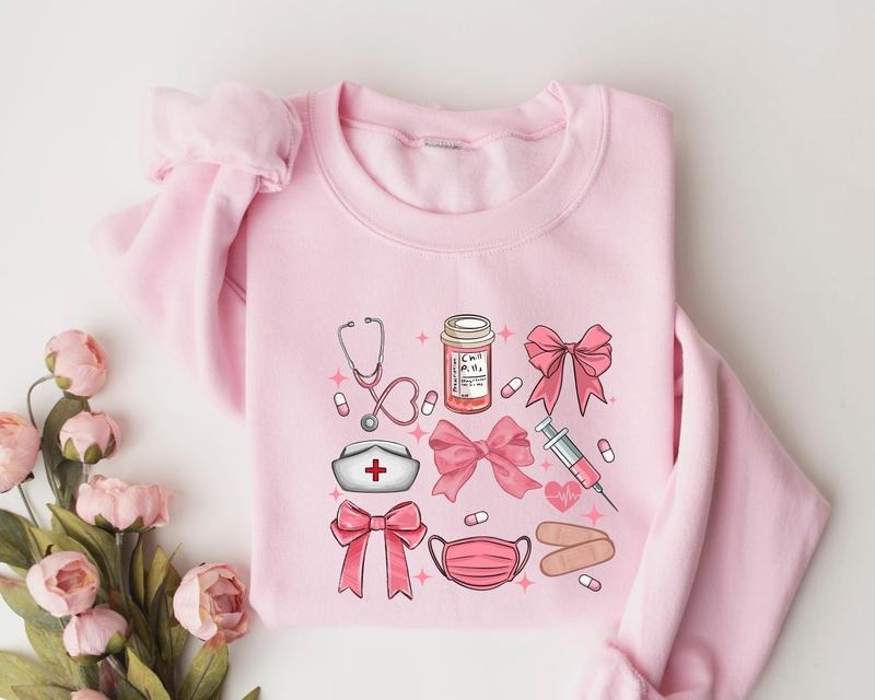 Coquette Nurse Sweatshirt, Pink Bow Nurse Sweatshirt, Girl Nurse Sweater, Nurse Graduation Shirt, Girly Nurse Birthday Gift, New Nurse Tee