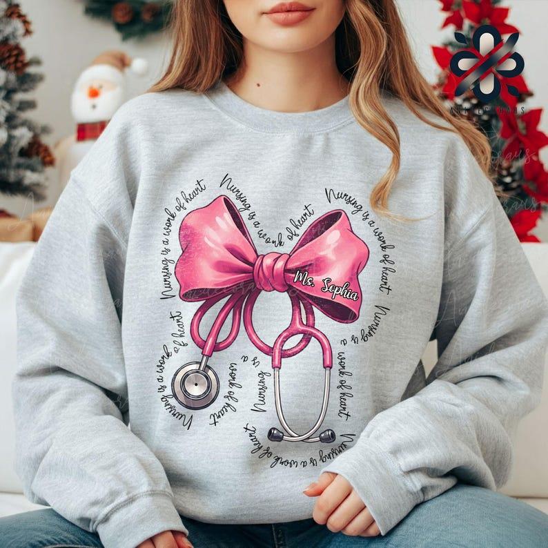 Personalized Coquette Nurse Stethoscope Bow Sweatshirt, Nurse Appreciation, Christmas Gift for Nurse, Nursing Pink Bow Shirt, Christmas Shirt