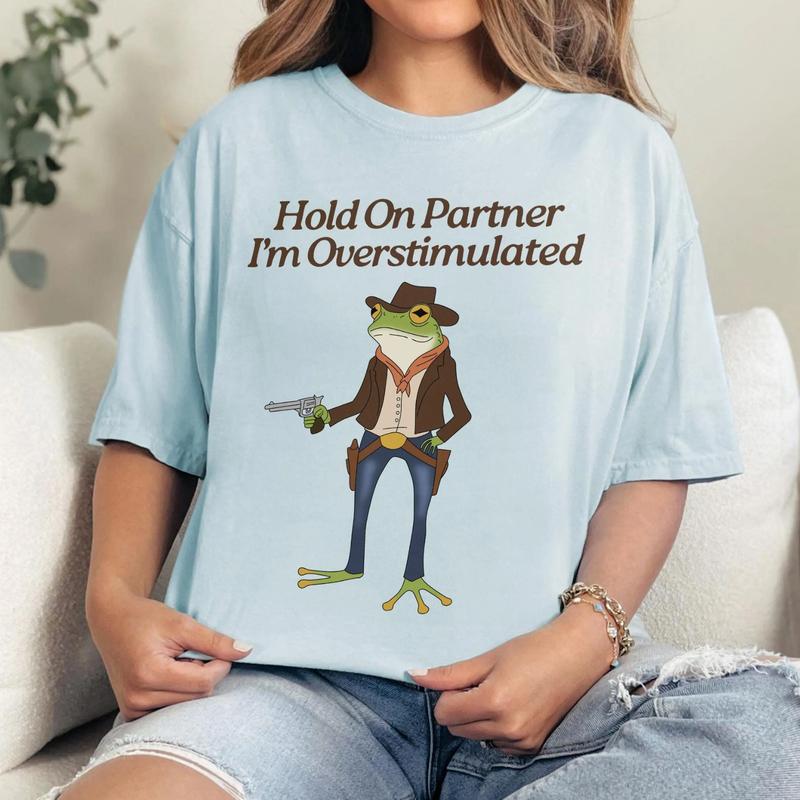 Hold On Partner, I'm Overstimulated Shirt - Quirky Cowboy Frog Tee, Unhinged Vibes, Gen Z Humor, Perfect for Meme Lovers