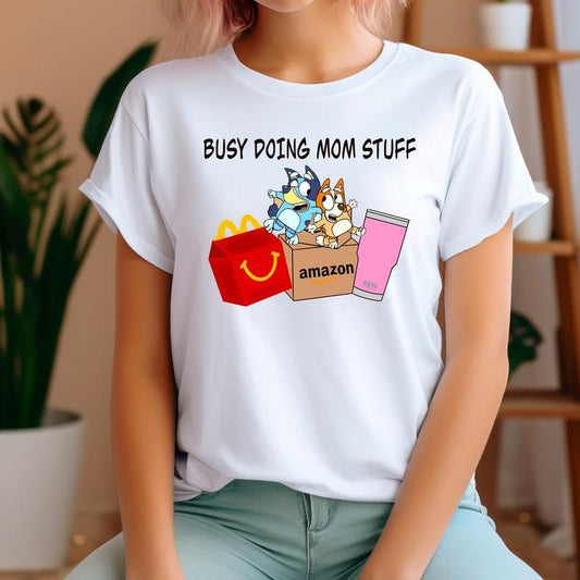 Busy Doing Mom Stuff Bluey T-shirt - Variety Of Designs - His And Hers Fashion - Streetwear Essentials - Sizes For All Bodies - Colors Galore