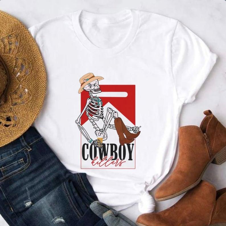 Cowboy Killers Graphic T-Shirt  Country Girl Tee, Vintage Tee, Boho Shirt Skeleton Cowboy marlboro shirt funny skeleton  T-shirt, sweater and Hoodie c