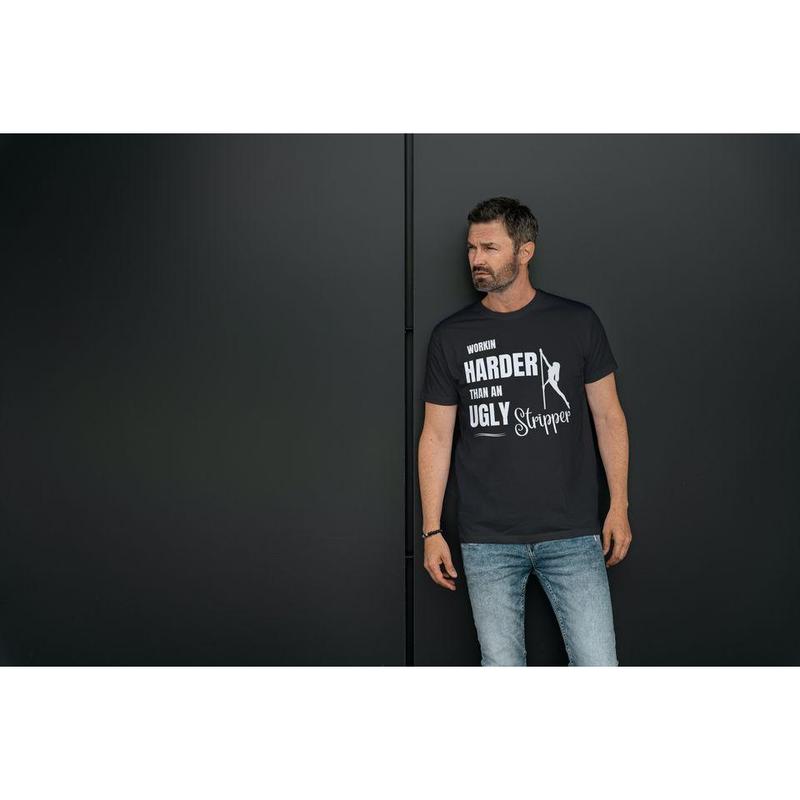 Short sleeve t-shirt. WORKIN HARDER THAN AN UGLY STRIPPER