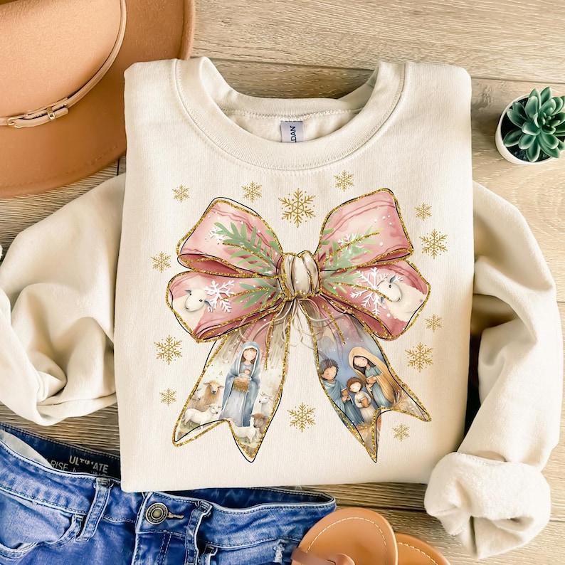 Jesus Christmas Coquette Bow Shirt, Christian Christmas Shirt, Nativity Scene Shirt, Baby Jesus Shirt, Pink Christmas, Gift For Him, Gift For Her