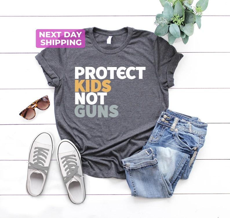Protect Kids Not Gns T-Shirt, Harris Walz Shirt, Vote Shirt, Unisex Cotton Tee