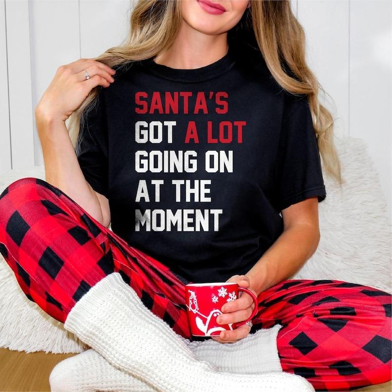 Santa's Got A Lot Going On At the Moment Shirt, Merry Christmas Shirt, Santa Shirt FOr Fan