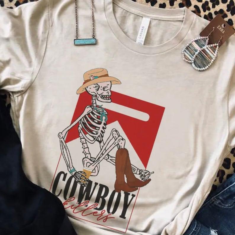 Cowboy Killers Graphic T-Shirt  Country Girl Tee, Vintage Tee, Boho Shirt Skeleton Cowboy marlboro shirt funny skeleton  T-shirt, sweater and Hoodie c