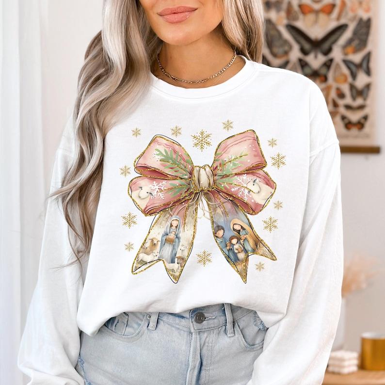Jesus Christmas Coquette Bow Shirt, Christian Christmas Shirt, Nativity Scene Shirt, Baby Jesus Shirt, Pink Christmas, Gift For Him, Gift For Her
