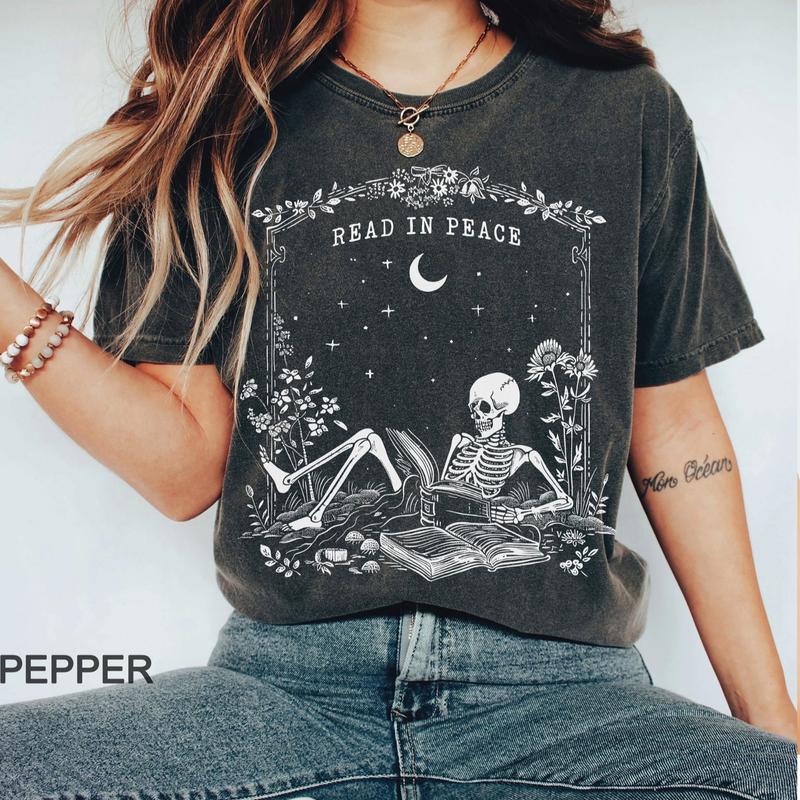 Read in Peace Shirt â€“ Skeleton Book Lover Halloween Tee, Perfect for Bookish Ghoul, Unisex T-shirt, Gift for Him, Gift for Her, Crew Neck, Trending T-