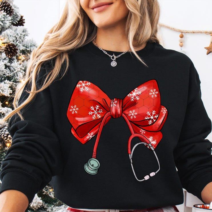 Coquette Nurse Stethoscope Sweatshirt, Coquette Bow Nurse Christmas Shirt, Holiday Medical, Nurse Shirt, Xmas Gift For Nurse, Unisex Shirt, Gift For H