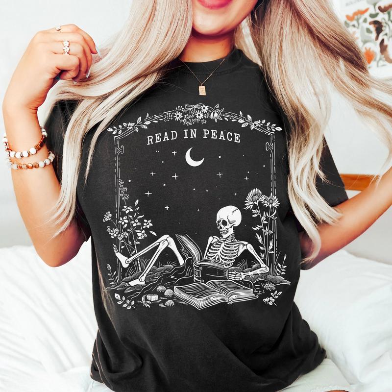 Read in Peace Shirt â€“ Skeleton Book Lover Halloween Tee, Perfect for Bookish Ghoul, Unisex T-shirt, Gift for Him, Gift for Her, Crew Neck, Trending T-