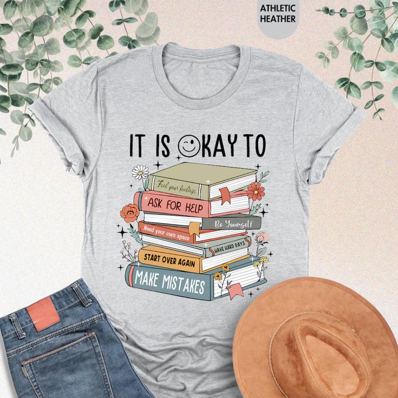 It's Okay To T-shirt â€“ Mental Health Shirt & School Counselor Gift, Positive Motivational Shirt, Books Tee, Gift for Him, Gift for Her, Crew Neck, Tre
