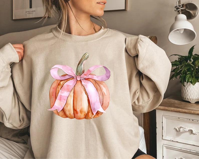 Pumpkin Coquette Bow Sweatshirt, Pink Bow Pumpkin Tee Shirt, Coquette Pumpkin Halloween Sweatshirt, Pumpkin Season Bow Shirt, Coquette Pumpkin Hallowe